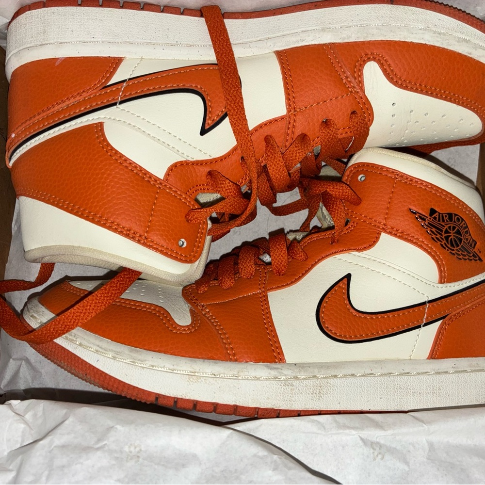 Orange and White Nike Jordan 1s